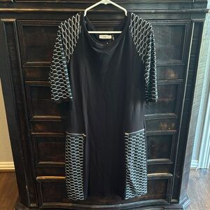 Trouble at the Mill Black Dress with White Geometric Sleeves